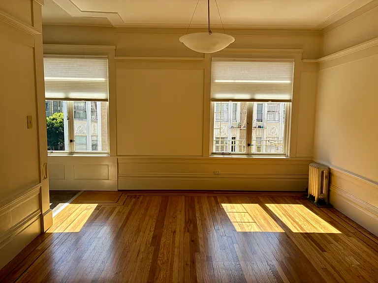 Sunny living space with classic molding