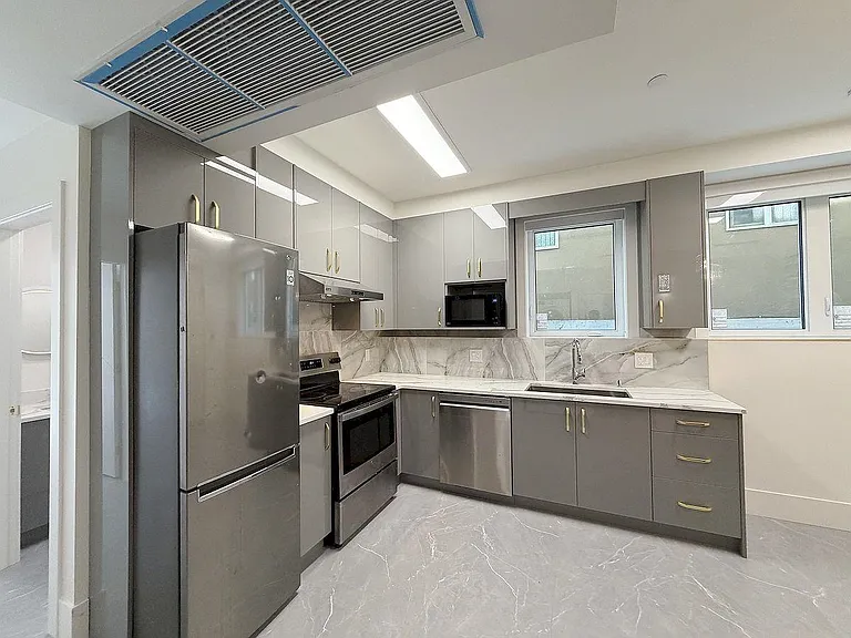 10XX E 62nd Ave — Photo 7
