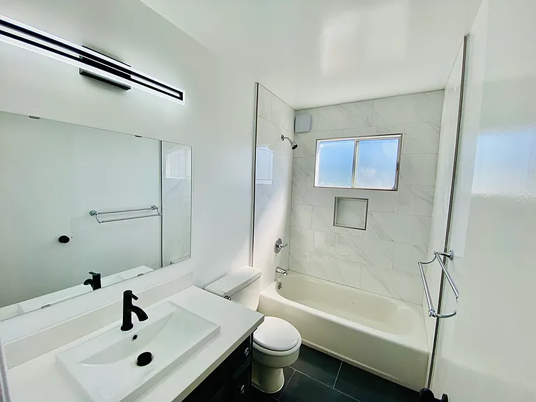 Bright newly remodeled bathroom.