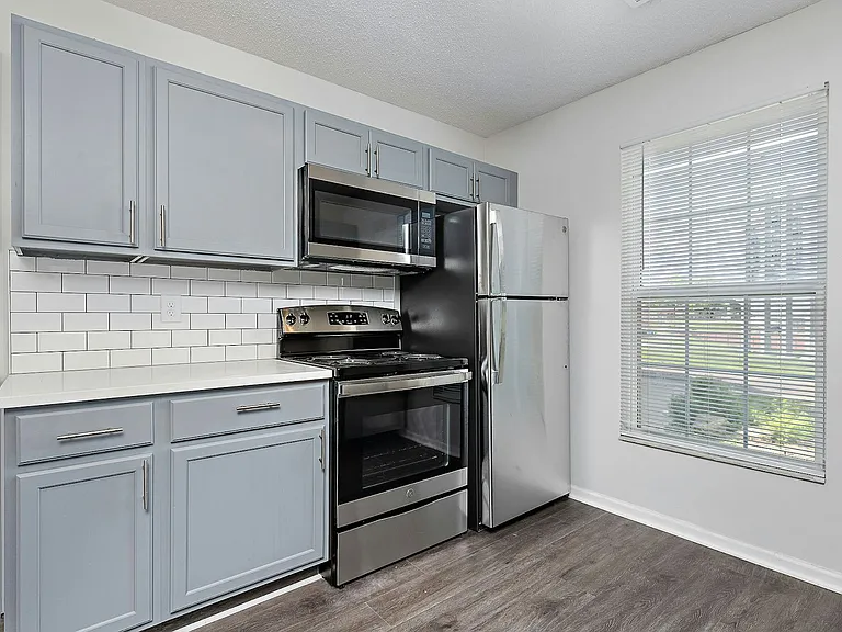 Kitchen - New appliances, countertops, cabinets, backsplash