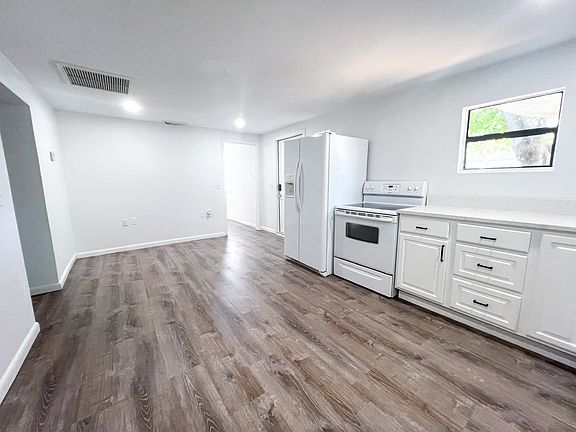 Kitchen, Dining and Living area