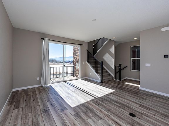 Large great room with lots of light.