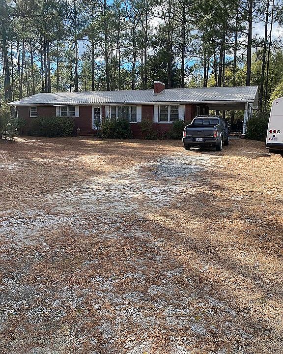 Front with carport entry