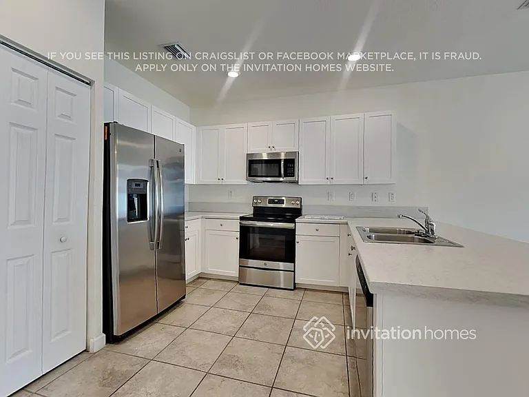 10554 W 33rd Way — Photo 7