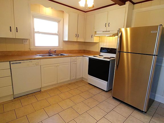 Kitchen includes stove, dishwasher and new stainless steel refrig