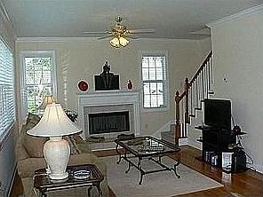 Open Living Room with hidden staircase