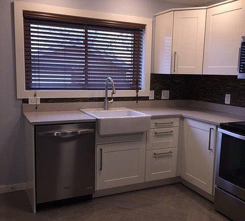 Kitchen. Window over sink looking out to back yard.