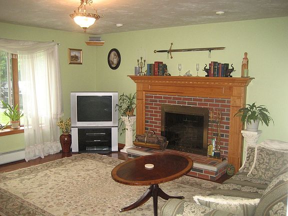 living w/brick fireplace