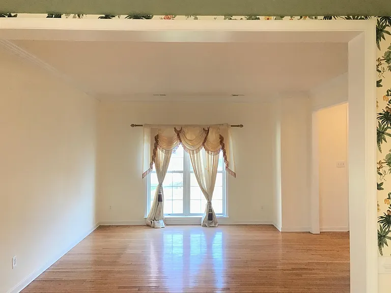 Formal room hardwood floor (curtains not included)