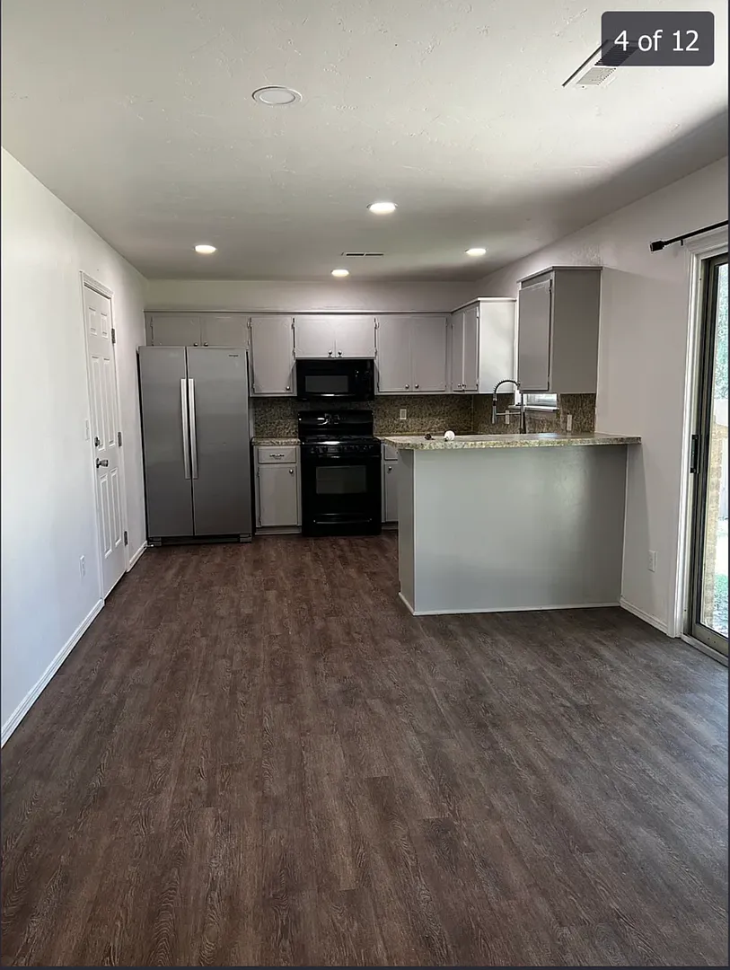 Updated 3 Bed, 2 Bath Home with Fireplace, Fenced Yard & 2-Car Garage — Photo 4