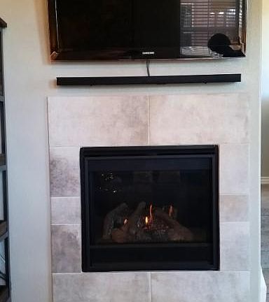 Gas fireplace, mount for TV with in-wall wiring.