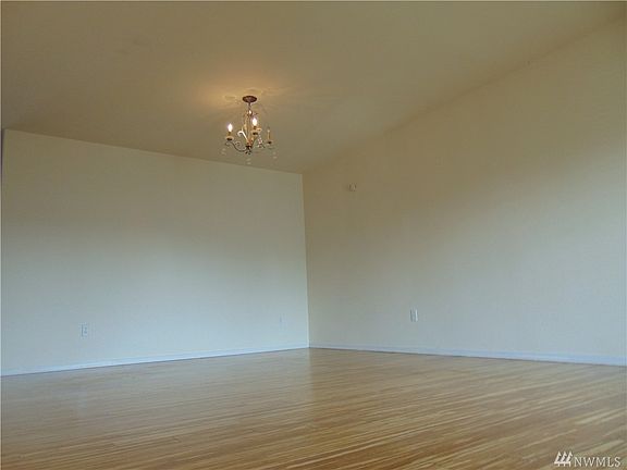 Entrance And Dinning Area. Extensive bamboo flooring throught home !