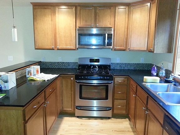 Spacious full kitchen with stainless appliances