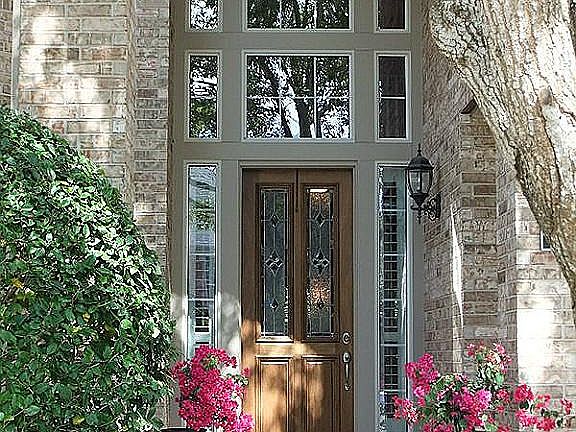 Grand two story covered front porch.