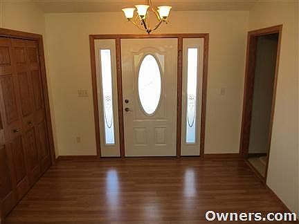 Spacious Foyer Entrance Hardwood Floors