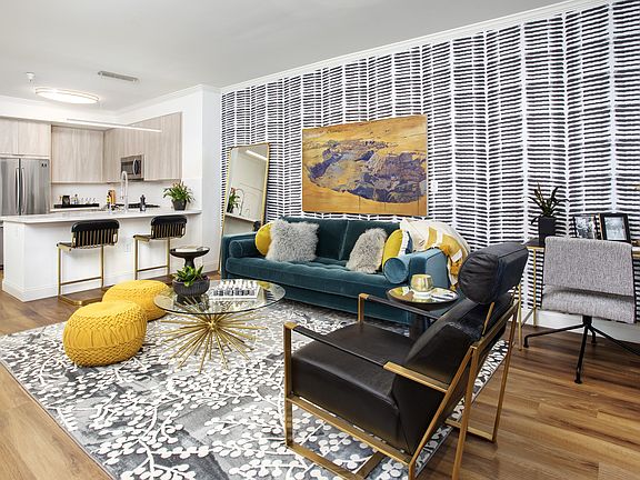 Open living and dining spaces at Reveal Playa Vista in Playa Vista, CA.