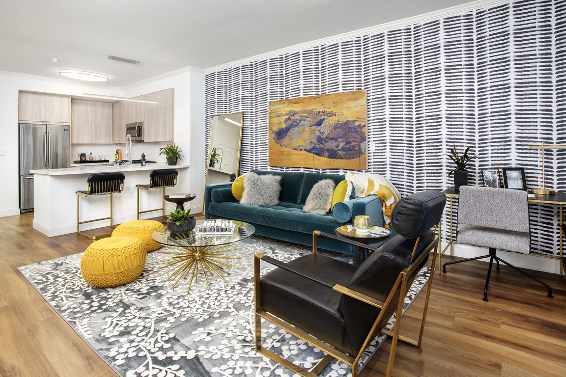 Open living and dining spaces at Reveal Playa Vista in Playa Vista, CA.