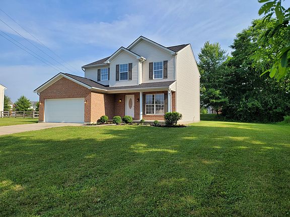 Gracious setting with large yard backing up to woods at a dead end - VERY QUIET !!!