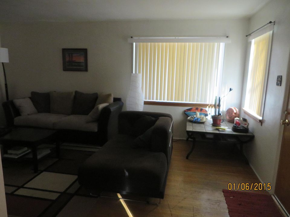 Living room with vertical blinds
