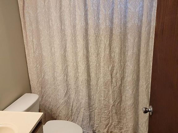 Full Bathroom off of the living room and by 2 bedrooms.