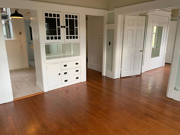 Living room with original built-in cabinets