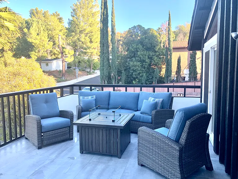 upstairs balcony, firepit couch and recliners - located off bedroom 2 and 3 with 180 degree views
