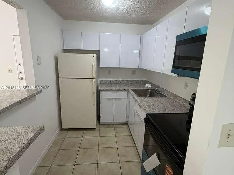 7160 NW 179th St #310 — Photo 8