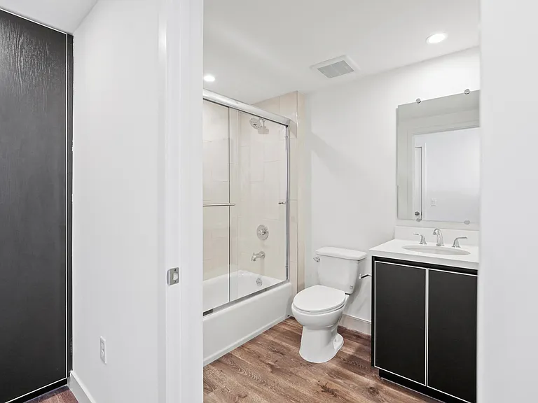 Bathroom with Shower Bath and Vanity Cabinet Storage