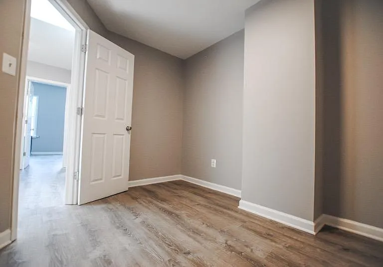 Head upstairs to find 2 bedrooms, a den, and bathroom