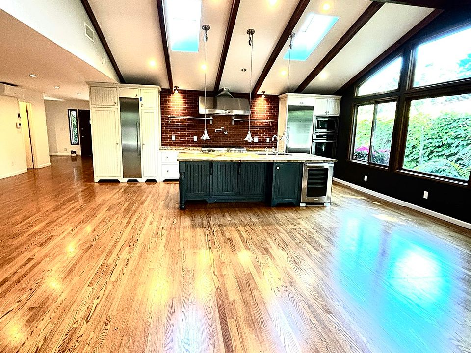 high ceiling and wall to wall windows