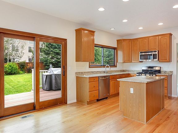 Eat in area and kitchen with beautiful yard views