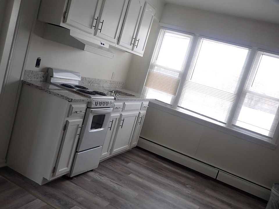 open kitchen has granite counter - great windows for lots of light