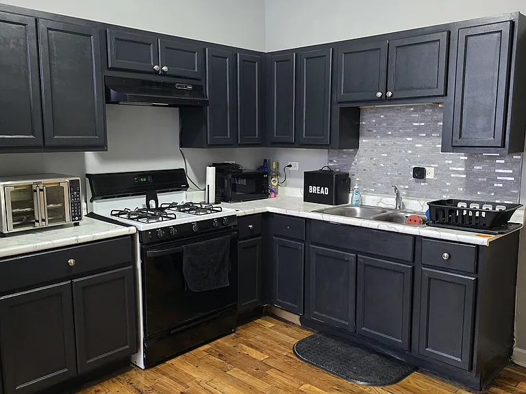 Kitchen w/ plenty of cabinet space. Refrigerator & stove included.