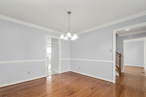 Formal dining room to the left of the front entrance