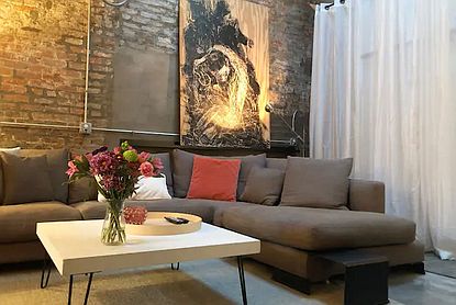 Living Room. Exposed Brick Wall.