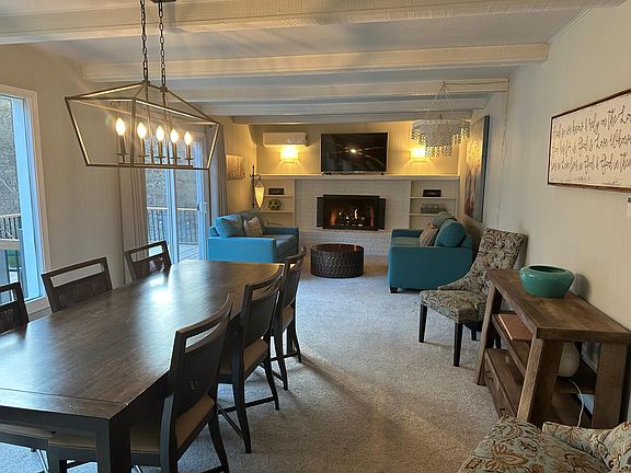 Open Concept Dining Room and Living Room with gas Fireplace