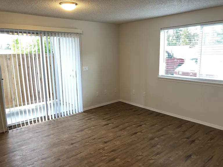 Spacious layout with sliding glass door that leads to your private patio