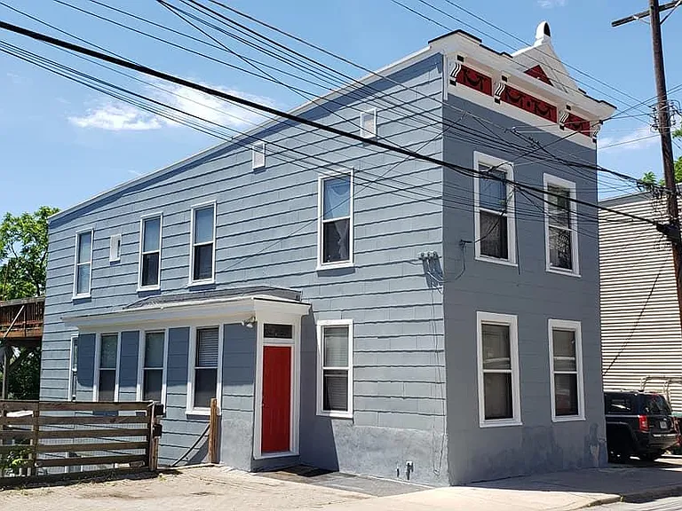 Sole offstreet parking spot is closest spot to the exterior stairs to the lower apartment