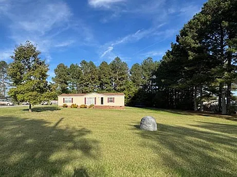 Welcome home! Beautiful curb appeal with a spacious front yard and plenty of parking.
