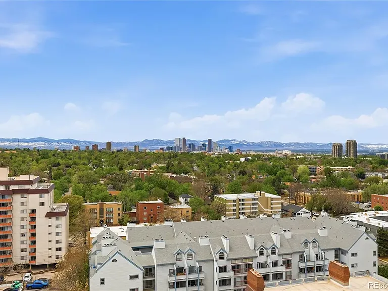 Rooftop deck with mountain and city views