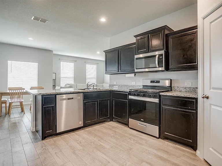 Spacious kitchen with lots of counter space.