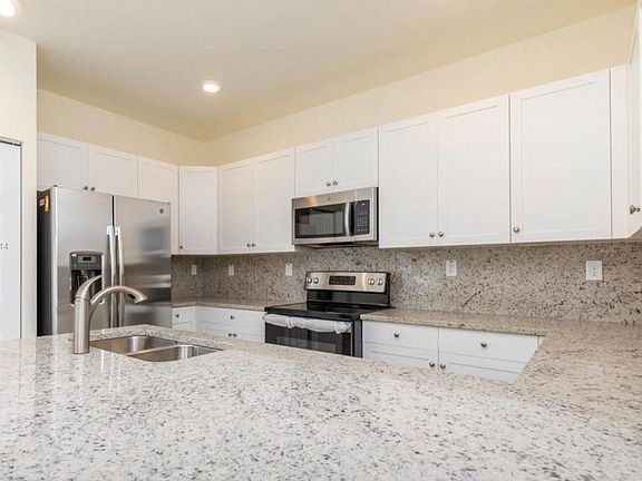 2nd image of 10575 W 33rd Way Unit 10575