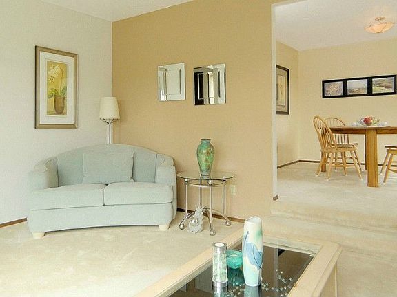 Step down into the large light filled living room.