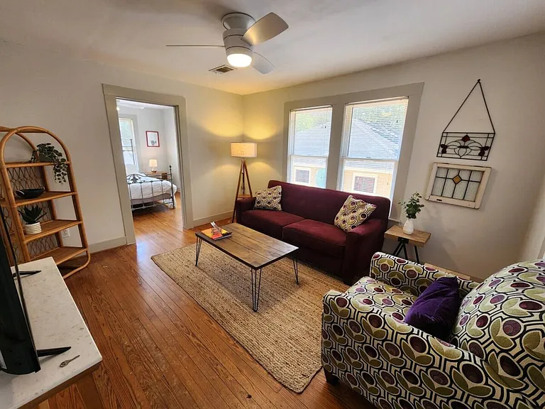 E 11th 1/2 St — Photo 1