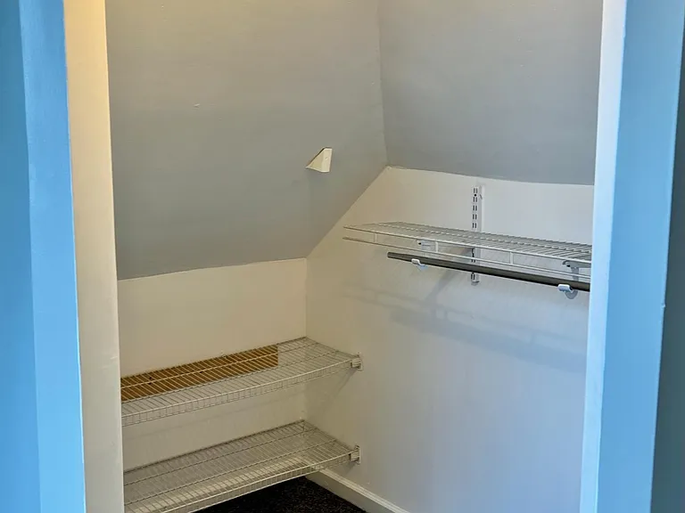 glimpse into 3rd bedroom closet