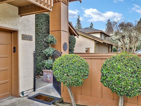 An attractive gate opens onto the front courtyard...