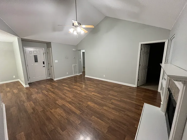 Large living room with fireplace.