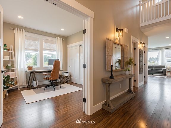 Bedroom with french doors off entry, currently used as an office