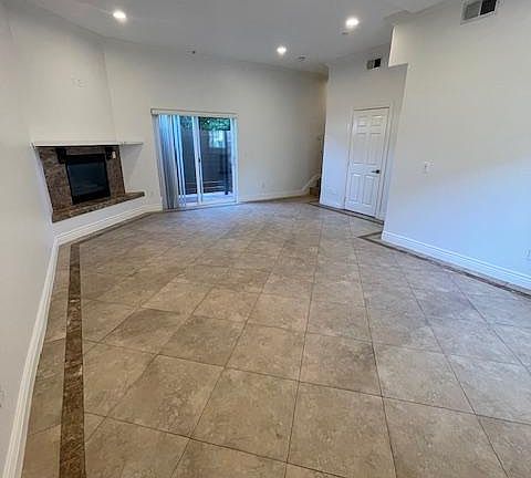 LARGE LIVING ROOM, DINING ROOM WITH FIRE PLACE