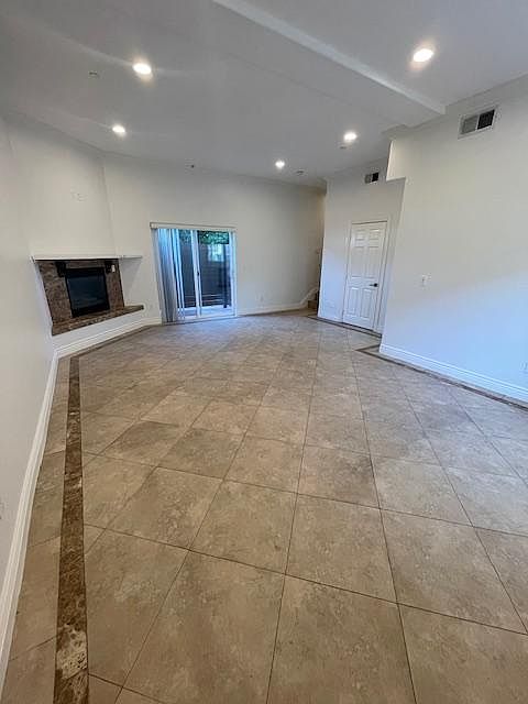 LARGE LIVING ROOM, DINING ROOM WITH FIRE PLACE